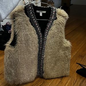Fur vest with trim